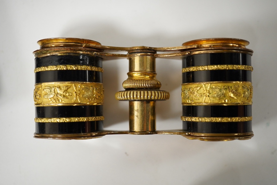 A pair of French opera glasses in case (a.f.), a wooden snuff-shoe, a carved wood walnut inkwell, a 